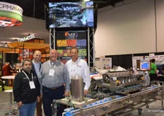 The team at A&B Packing proudly shows a blueberry packing machine. From left to right: Erick Turra, Josh Gray, Randy Miedema and Chris Barbiasz.